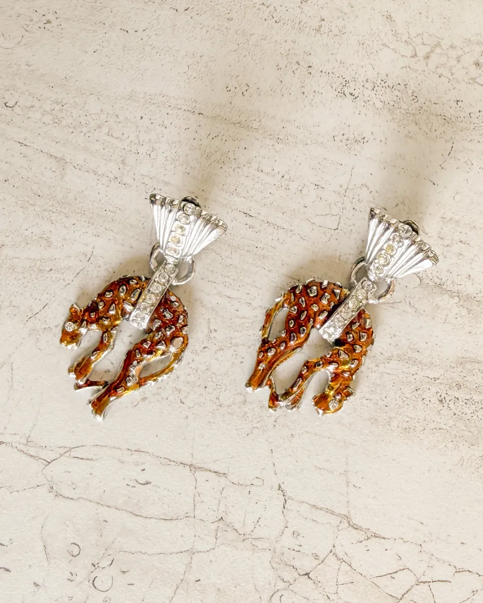 vintage Silver leopard crystal statement clip on earrings sold by Care Tucker