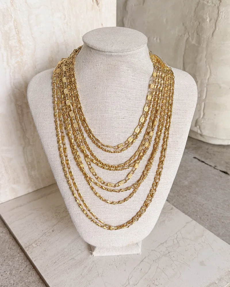 Vintage multi-strand gold-tone chain necklace sold by Care Tucker