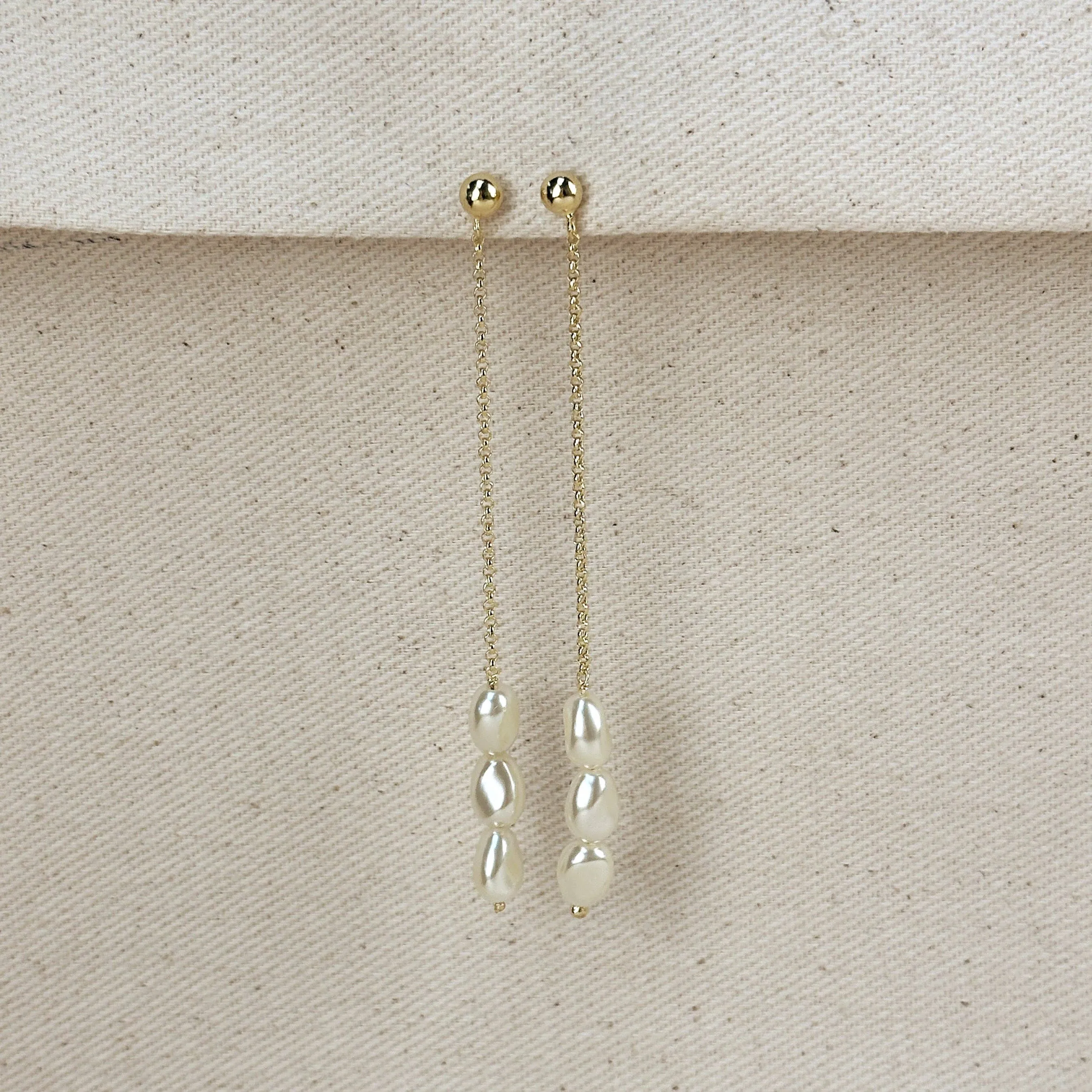 18k Gold Filled Row of Baroque Pearls Drop Earrings sold by Care Tucker