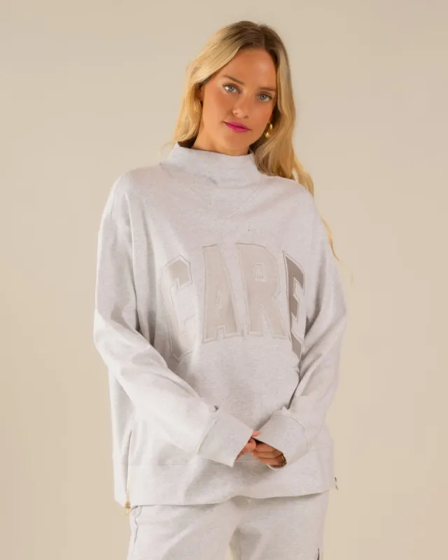 Bella Interlock Mock Neck Ice Grey sold by Care Tucker