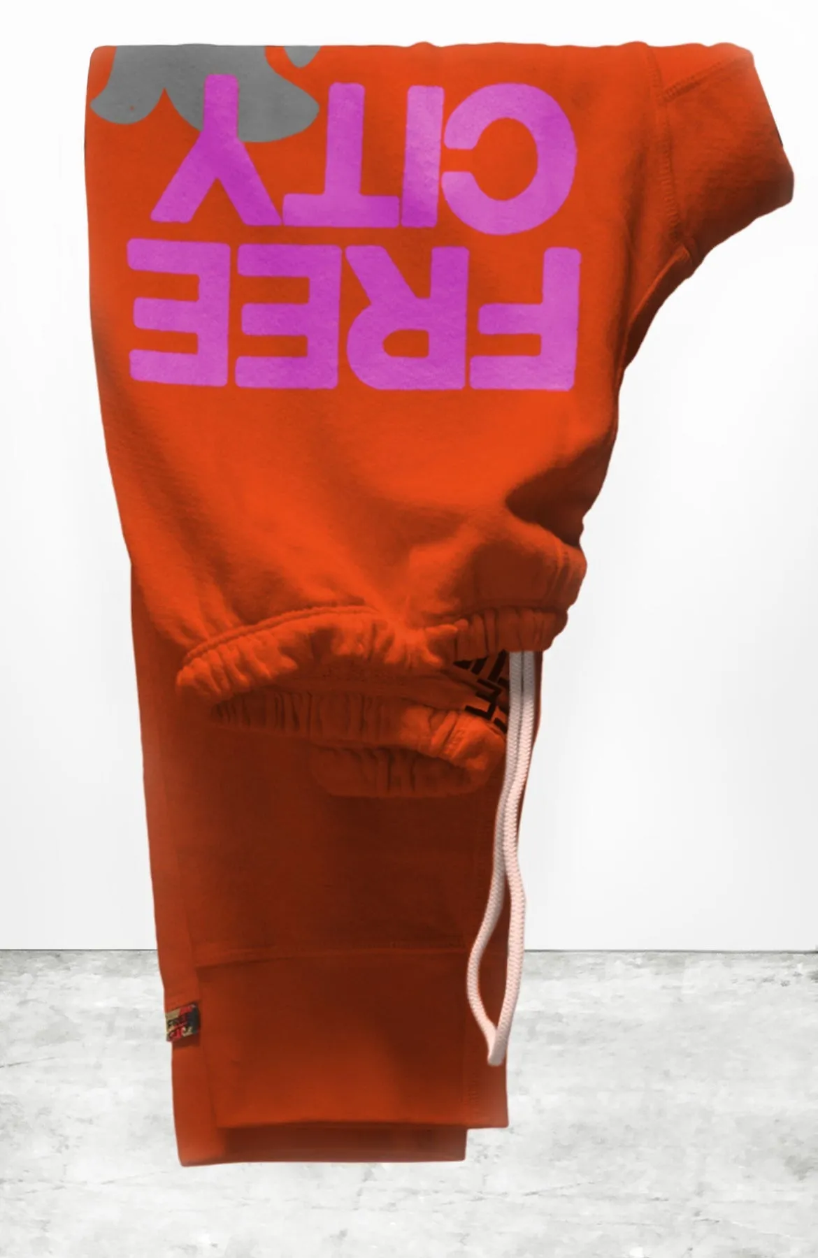 FREECITY 3/4 sweats - ORANGE MACHINE sold by Care Tucker