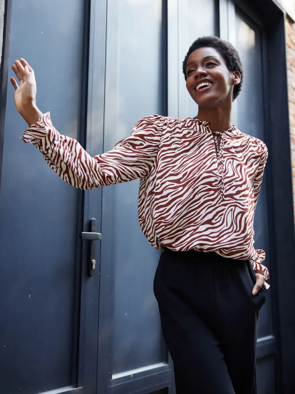 Zebra Stripe Blouse sold by Daily Thread