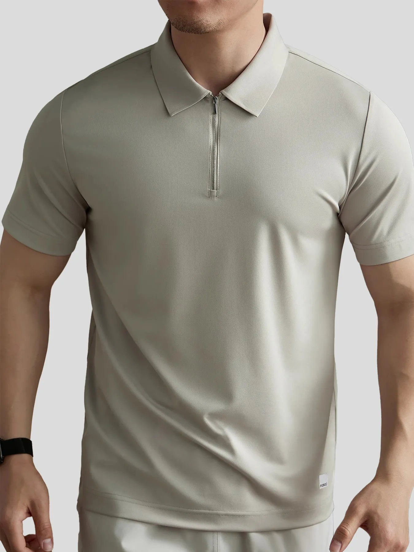 PerformancePro Piqué Short Sleeve Half Zip Polo sold by Fioboc