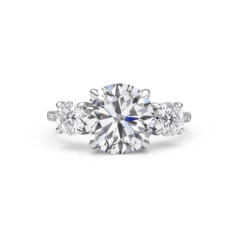 Adorned Celestia Three Stone Round Cut Moissanite Ring sold by Ghetluxe