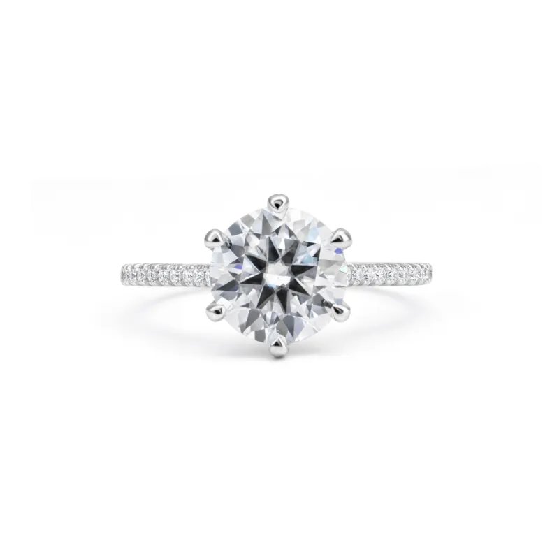 Adorned Six-Prong Round Cut Moissanite Ring sold by Ghetluxe