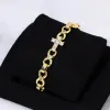 Women's 12mm Cross Bracelet in Gold sold by Ghetluxe