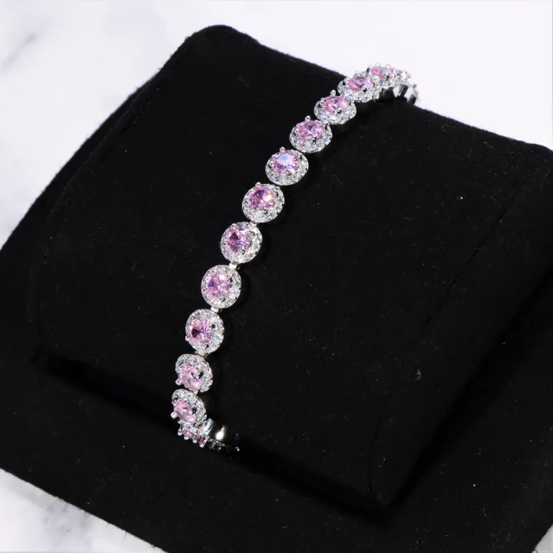 Women's Round Cut Pink Clustered Tennis Bracelet White Gold sold by Ghetluxe