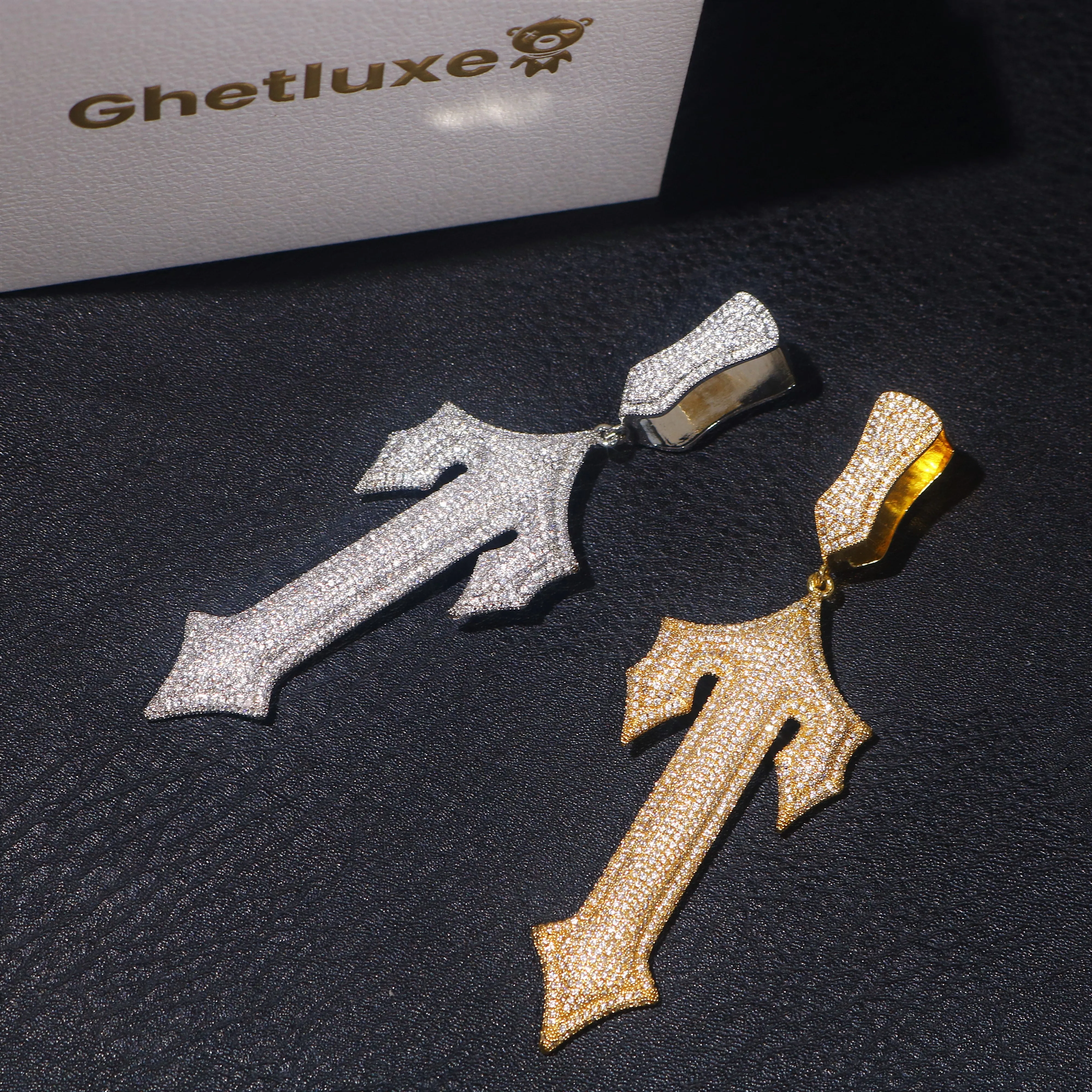 Large Full Iced T Pendant sold by Ghetluxe