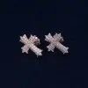 Diamond Cross Stud Earrings sold by Ghetluxe