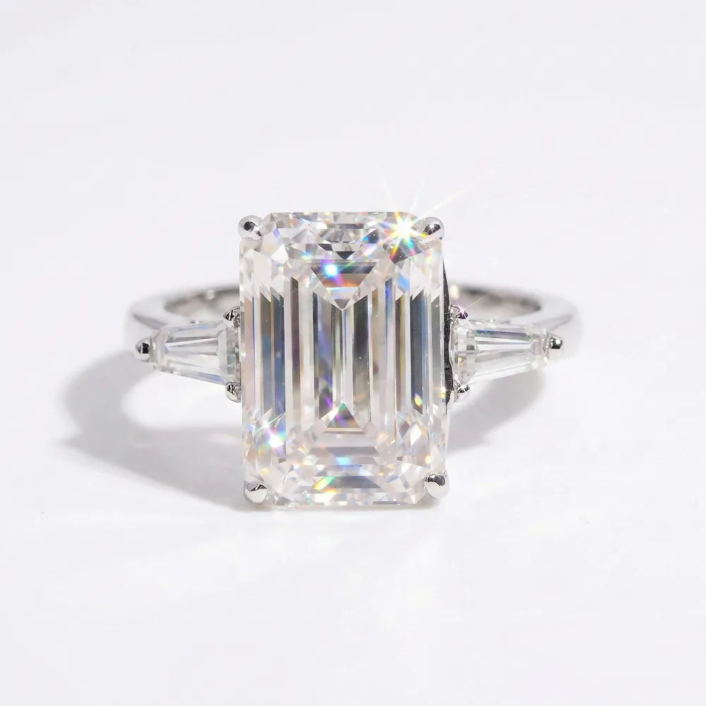Emerald Cut Moissanite Engagement Ring in Three Stone Setting sold by Ghetluxe