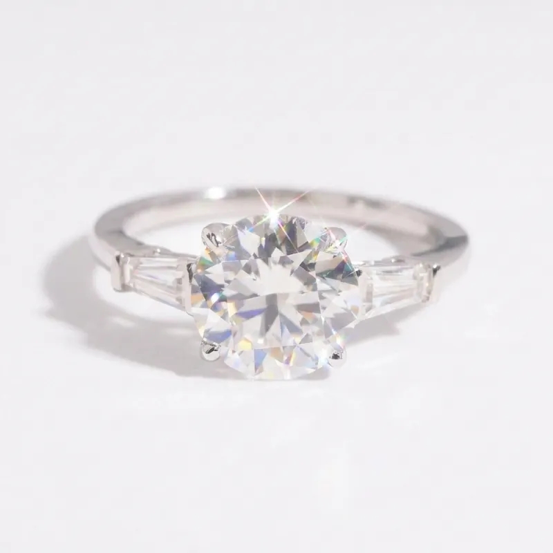 Round Cut Moissanite Engagement Ring in Three Stone Setting made by Ghetluxe