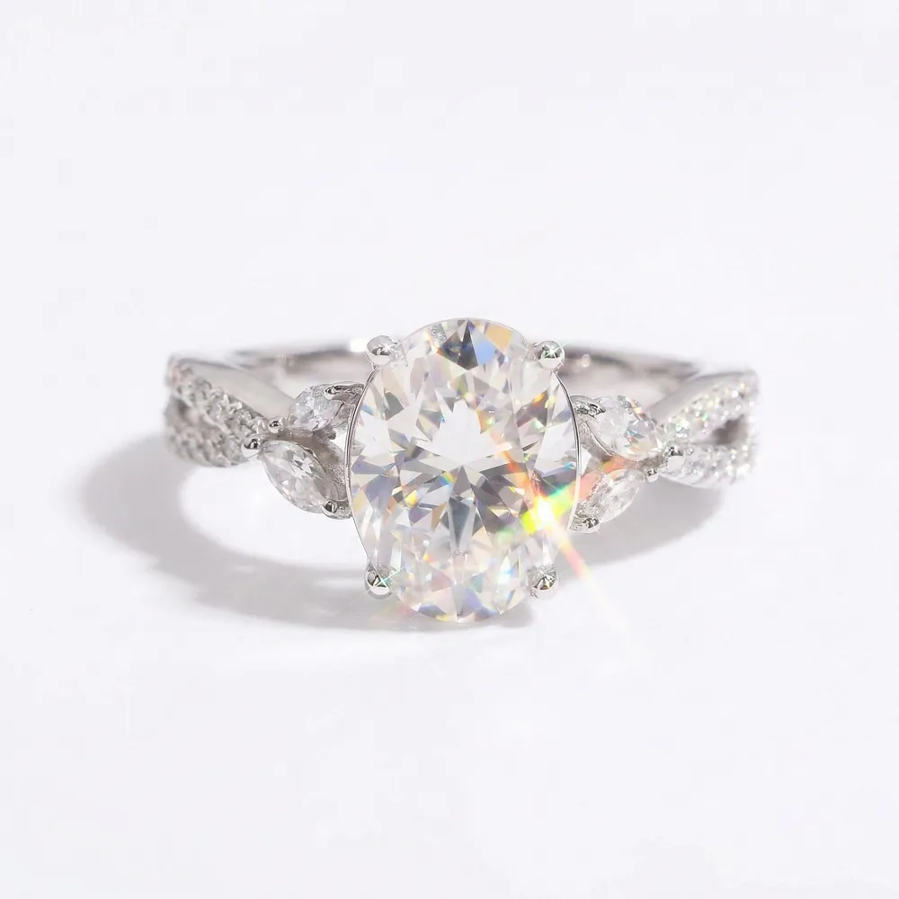 Twisted Pavé Oval Cut Moissanite Engagement Ring sold by Ghetluxe