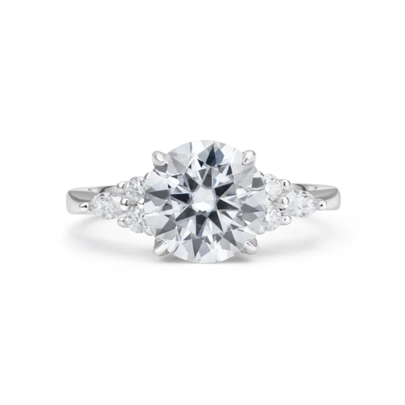 Luxe Three Stone Round Cut Moissanite Ring in Sterling Silver sold by Ghetluxe