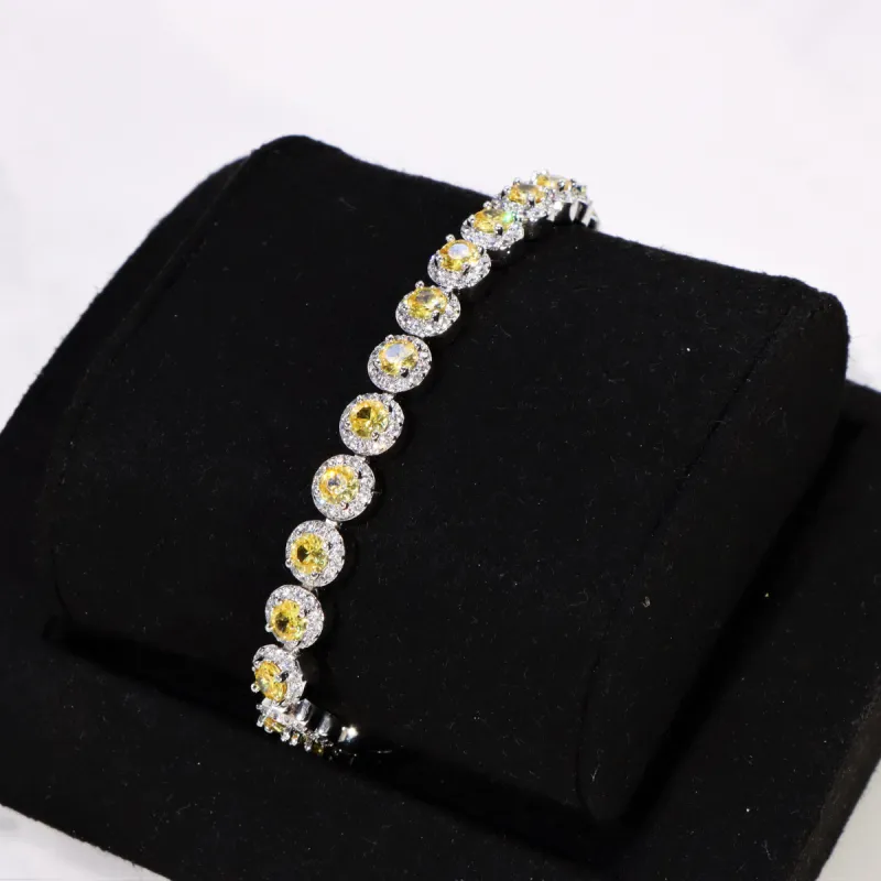 Women's Round Cut Yellow Clustered Tennis Bracelet White Gold sold by Ghetluxe