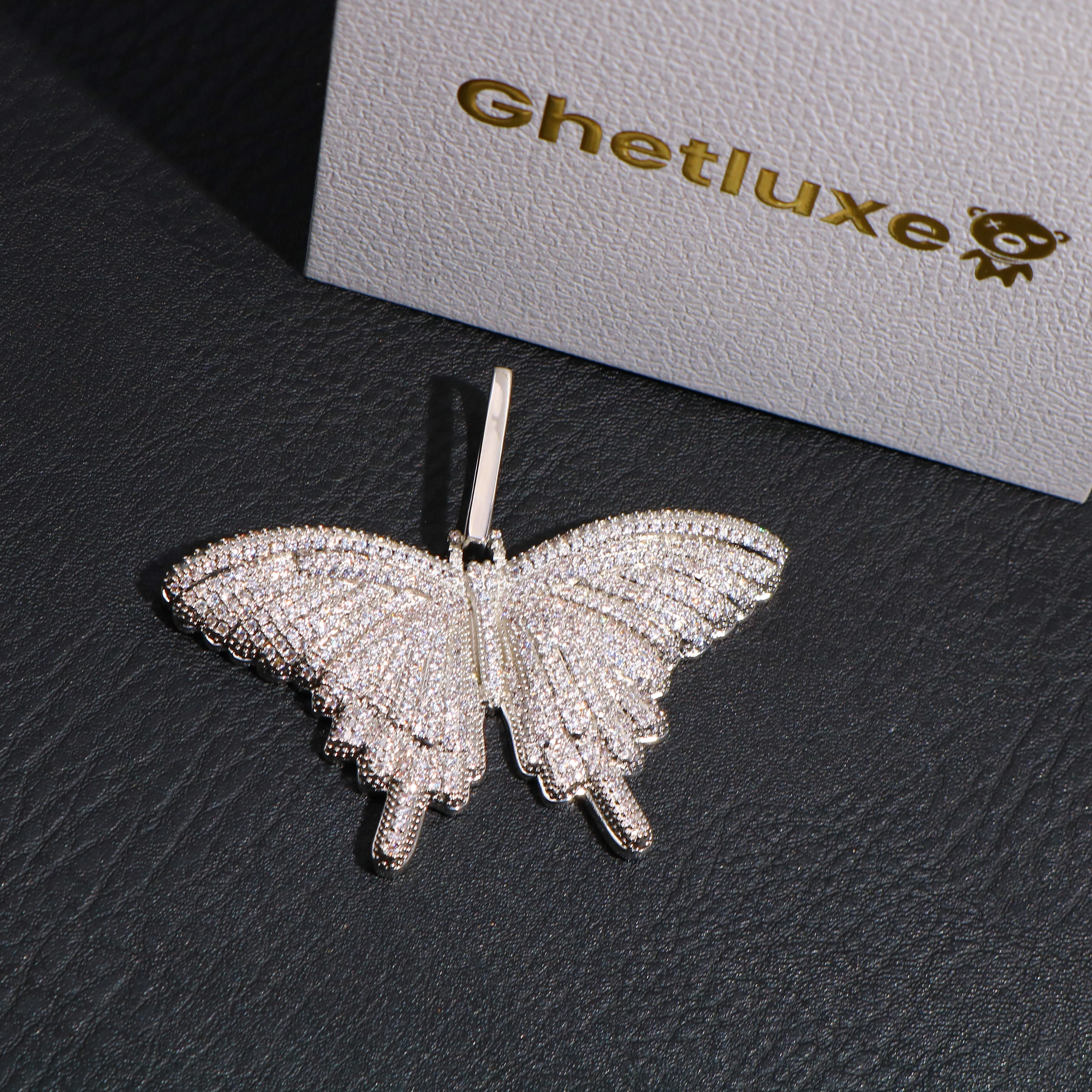 Iced Butterfly Pendant in White Gold sold by Ghetluxe