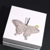 Iced Butterfly Pendant in White Gold sold by Ghetluxe
