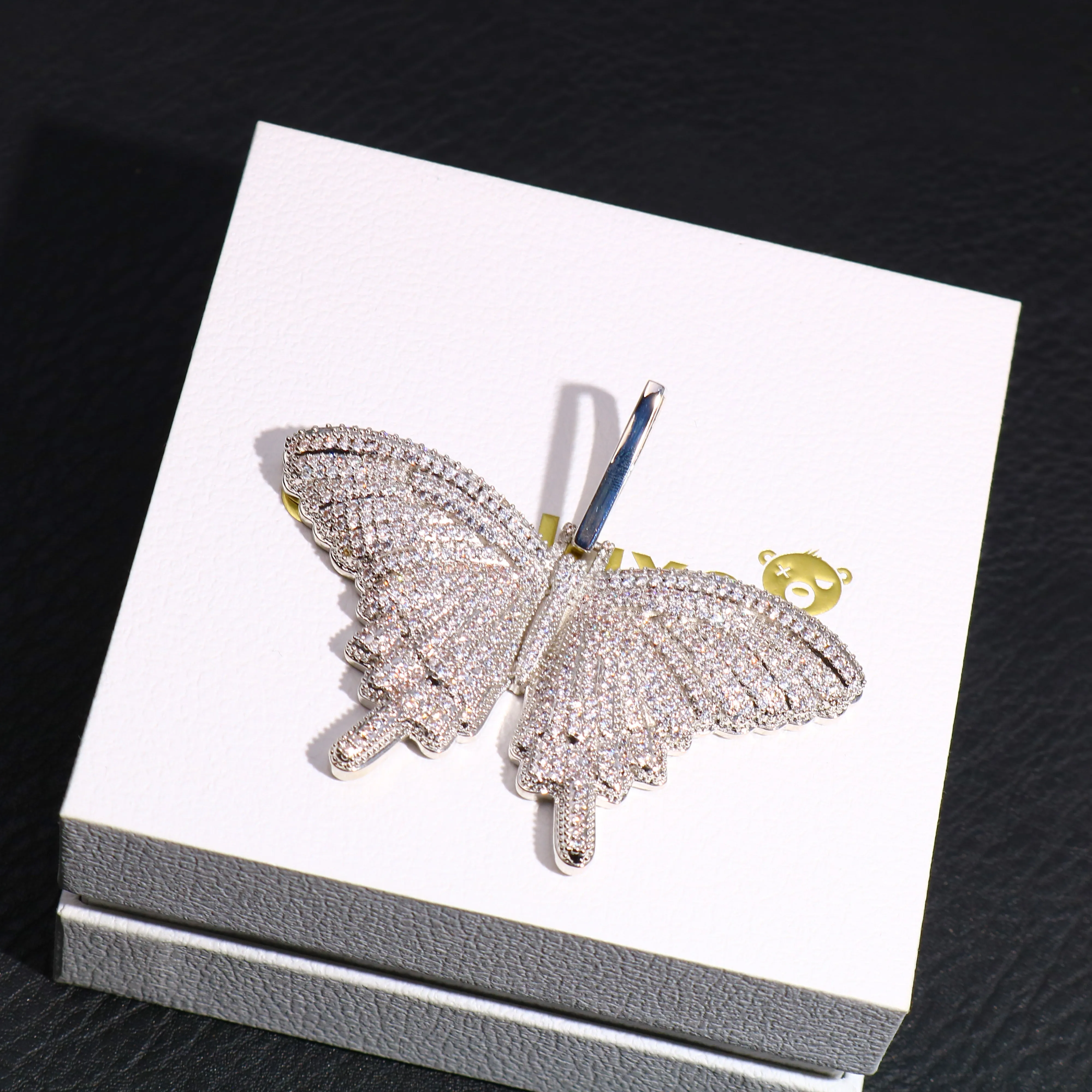 Iced Butterfly Pendant in White Gold sold by Ghetluxe product image thumbnail 2