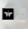 Iced Butterfly Pendant in White Gold sold by Ghetluxe