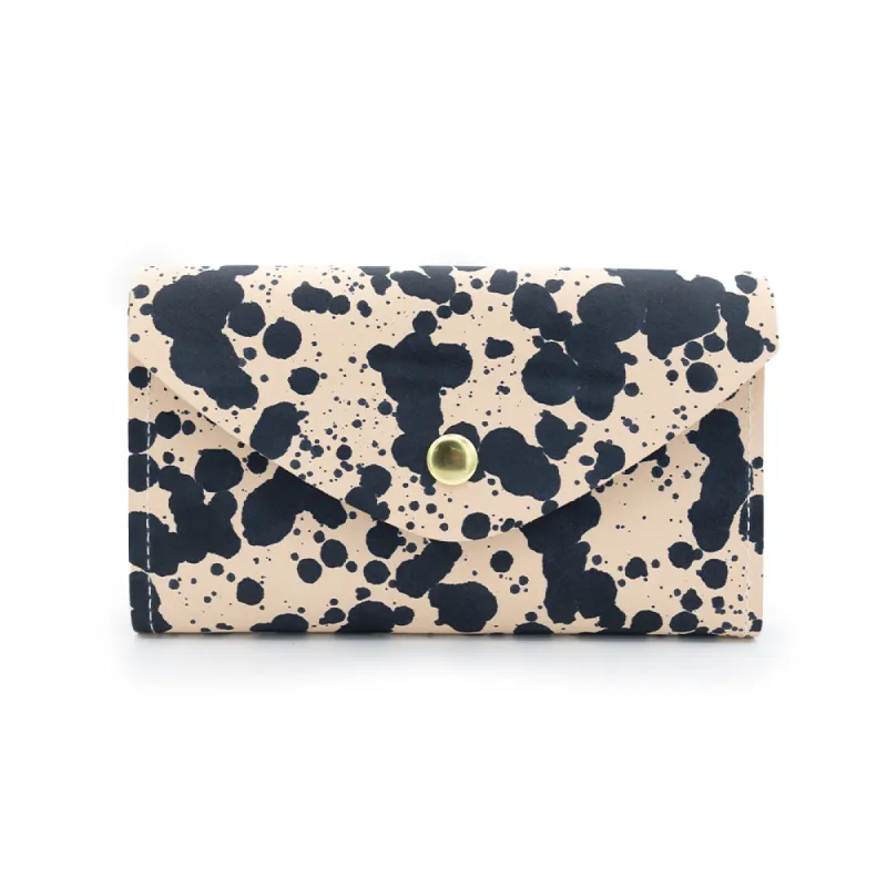 In a Snap Wallet sold by Glad & Young Studio