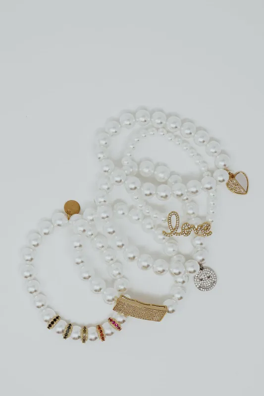 Swanky 5 Piece Pearl Charm Bracelet Stack sold by KC Chic Designs