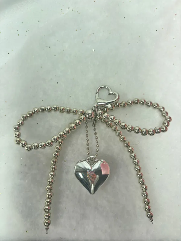 Silver Bow Heart Charm sold by KC Chic Designs