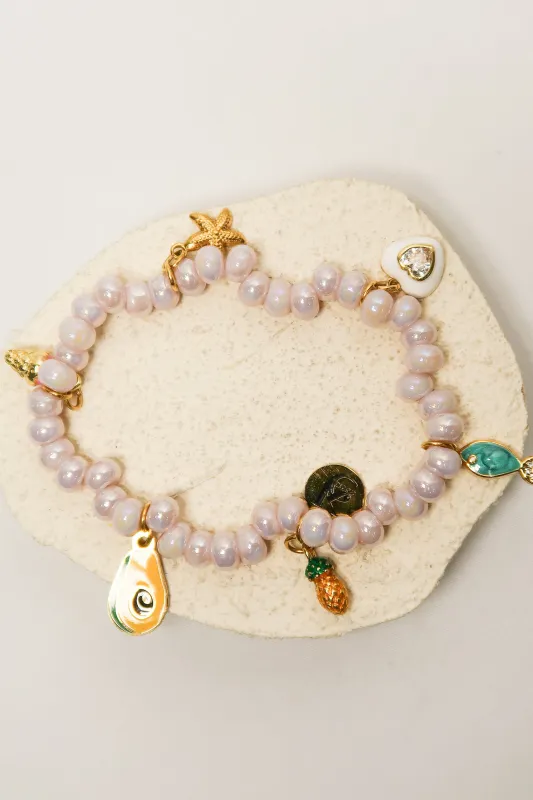 Ocean Wink Charm Pearlized Bracelet sold by KC Chic Designs