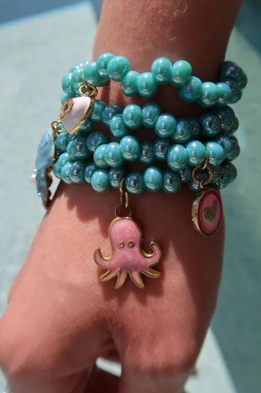 Sun & Shell 4 Piece Pearlized Bracelet 4 piece Stack sold by KC Chic Designs