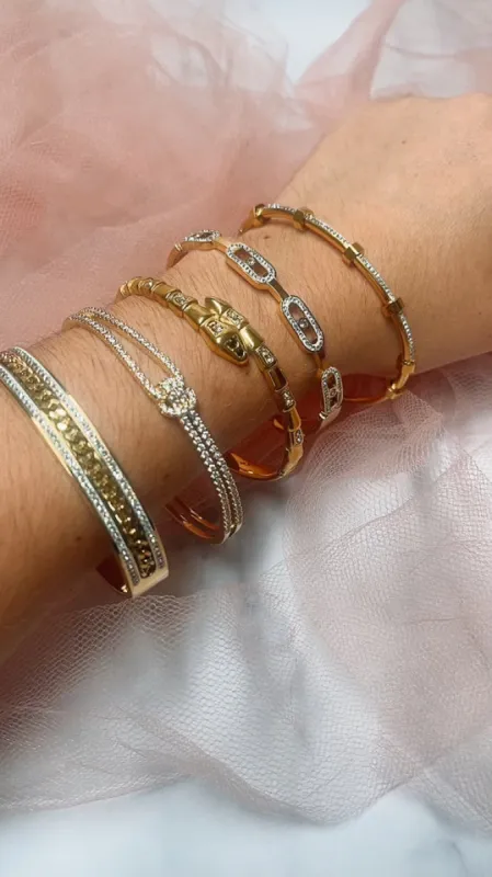 Go For the Gold with KC's 5 Golden Bangles sold by KC Chic Designs