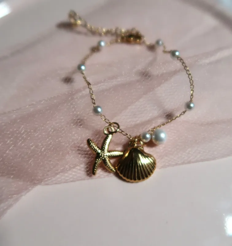 Pearl SeaShell Bracelet sold by KC Chic Designs