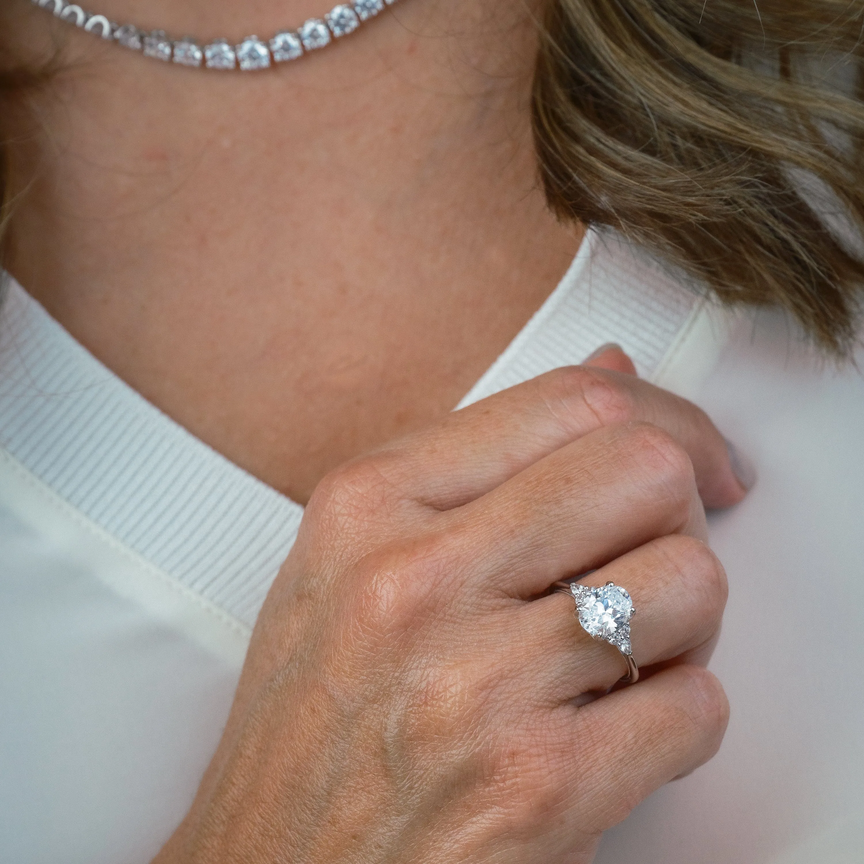 White Classic Pear Round Side Stone Ring with 1 1/2ct Oval Certified Lab Diamond Center sold by Kirk Kara product image thumbnail 2