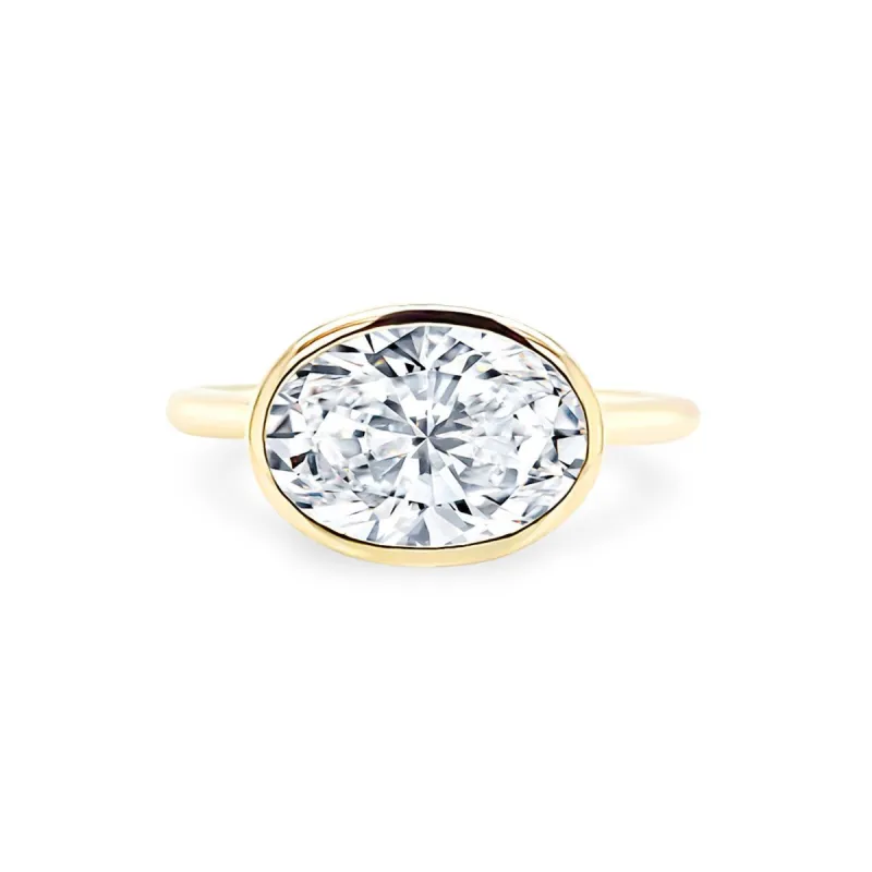 East West Bezel Set Oval Cut Solitaire sold by LINDSEY LEIGH JEWELRY