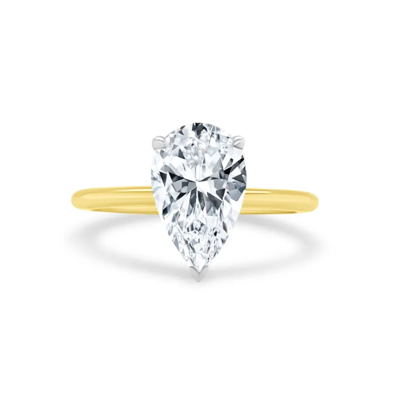 Pear Cut Solitaire sold by LINDSEY LEIGH JEWELRY