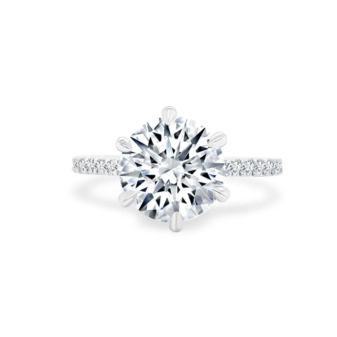 Round Solitiare on Diamond Band sold by LINDSEY LEIGH JEWELRY