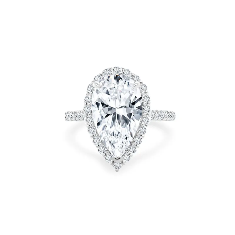 Pear Cut Solitaire with Halo sold by LINDSEY LEIGH JEWELRY