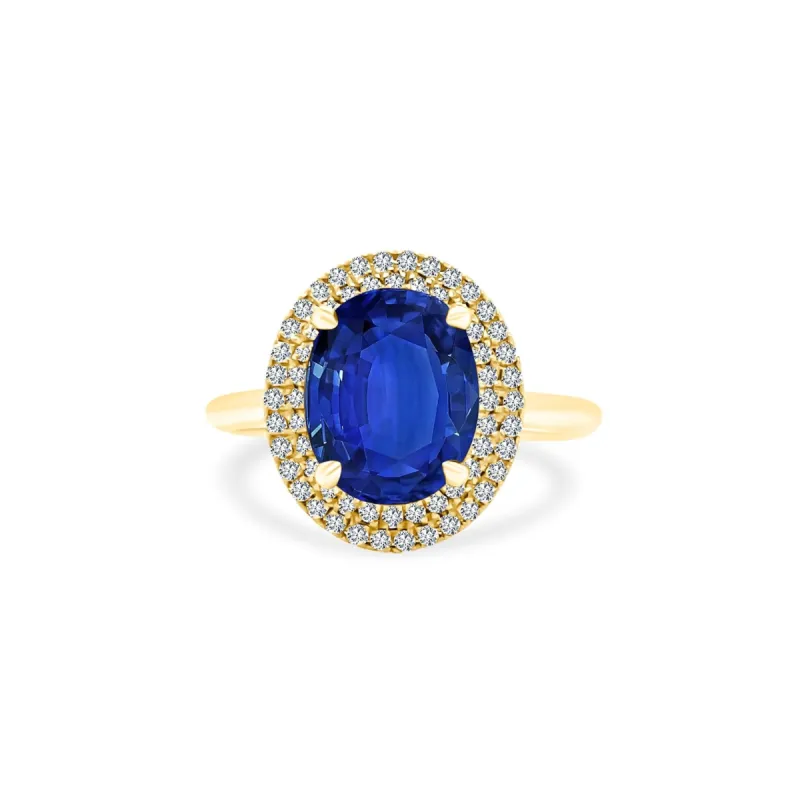 Oval Cut Sapphire Solitaire with Double Halo sold by LINDSEY LEIGH JEWELRY