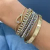 Diamond Bezel Loop Bangle sold by LINDSEY LEIGH JEWELRY