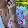 Diamond Bezel Loop Bangle sold by LINDSEY LEIGH JEWELRY