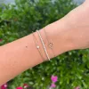 Gold & Diamond Flower Bracelet sold by LINDSEY LEIGH JEWELRY