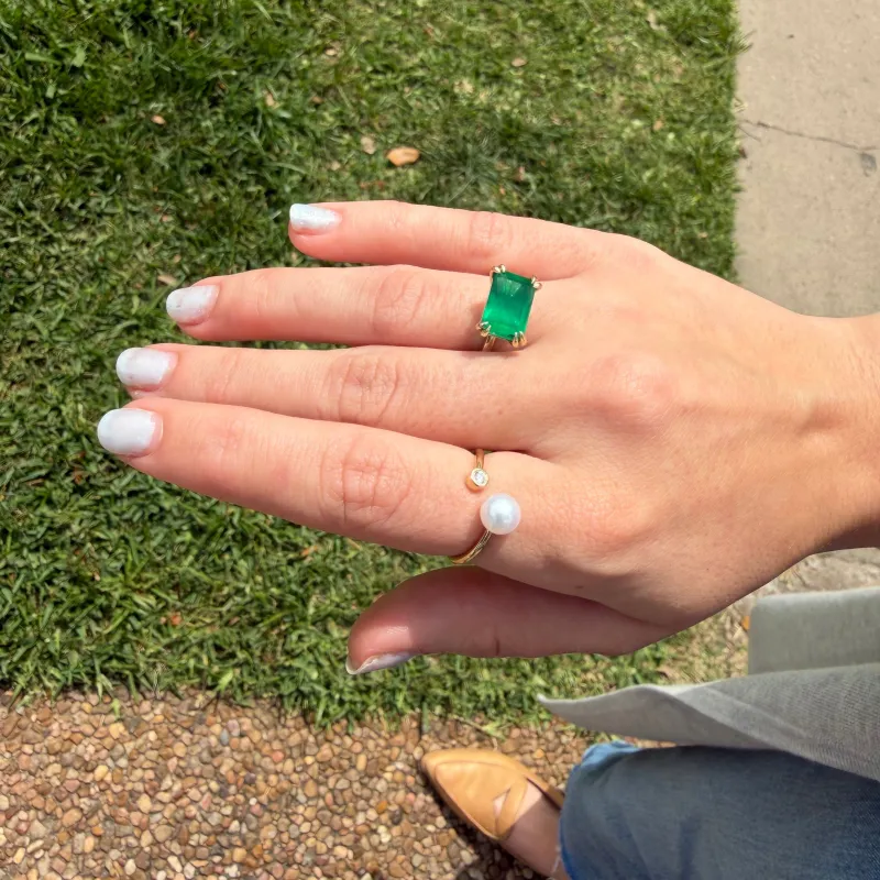 East West Emerald Cut Emerald Solitaire made by LINDSEY LEIGH JEWELRY