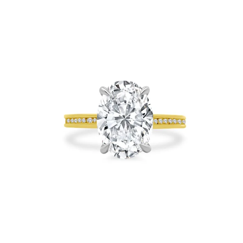 Oval Cut Solitaire on Channel Set Diamond Band sold by LINDSEY LEIGH JEWELRY