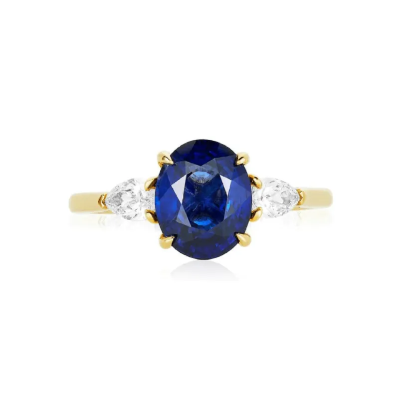 Oval Cut Sapphire with Pear Cut Diamond Side Stones sold by LINDSEY LEIGH JEWELRY