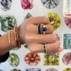 Oval Cut Sapphire with Pear Cut Diamond Side Stones sold by LINDSEY LEIGH JEWELRY