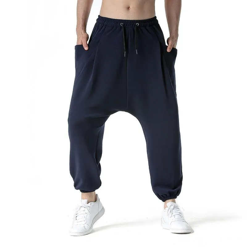 Men's Solid Loose Elastic Waist Harem Sports Pants 12926994Z sold by Manly