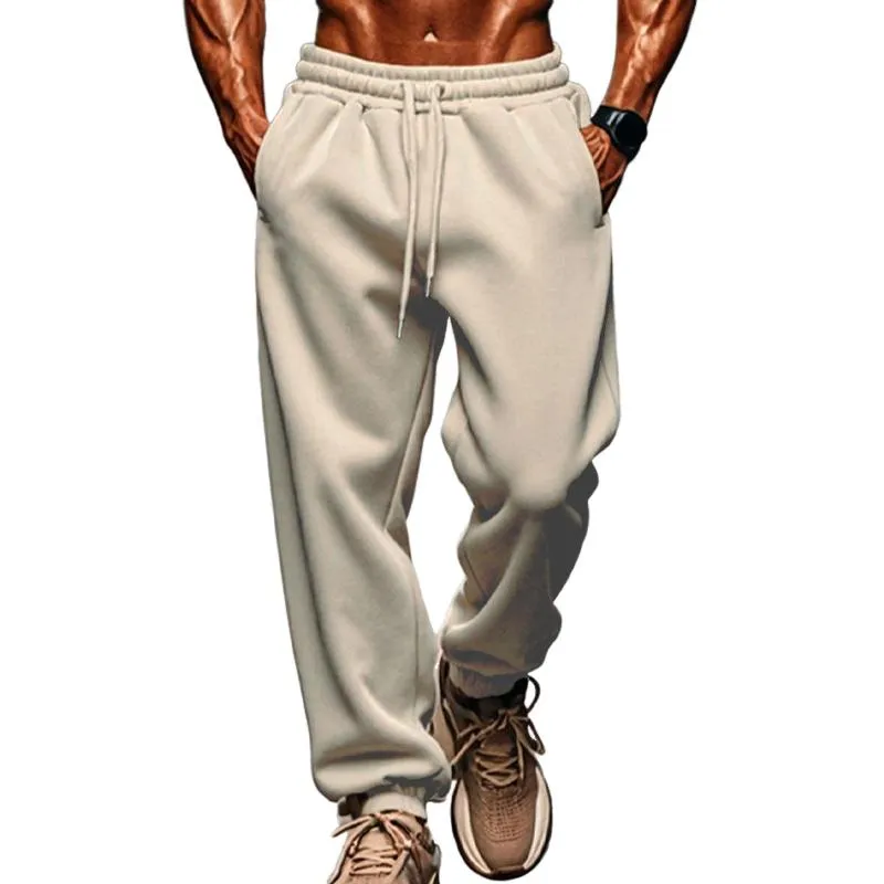 Men's Solid Color Elastic Waist Loose Sports Pants 05804680Z sold by Manly