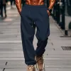 Men's Solid Color Elastic Waist Loose Sports Pants 05804680Z sold by Manly
