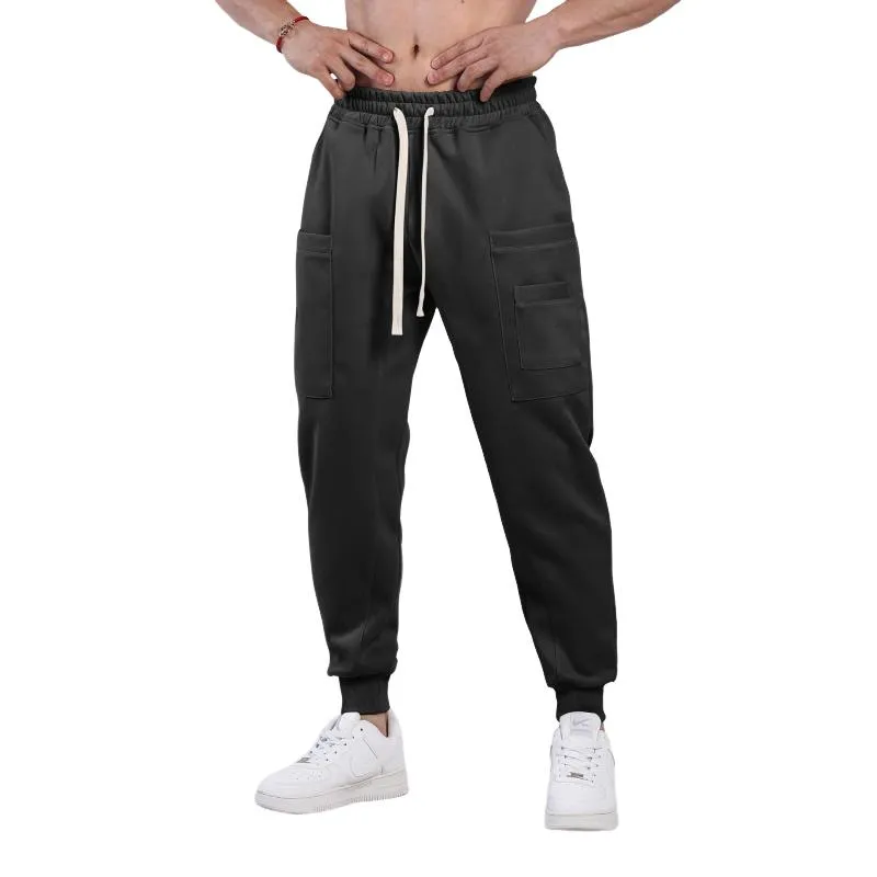 Men's Solid Color Elastic Waist Loose Sports Pants 46625398Z sold by Manly