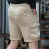 Men's Solid Multi-Pocket Sports Cargo Shorts 59276423Y sold by Manly