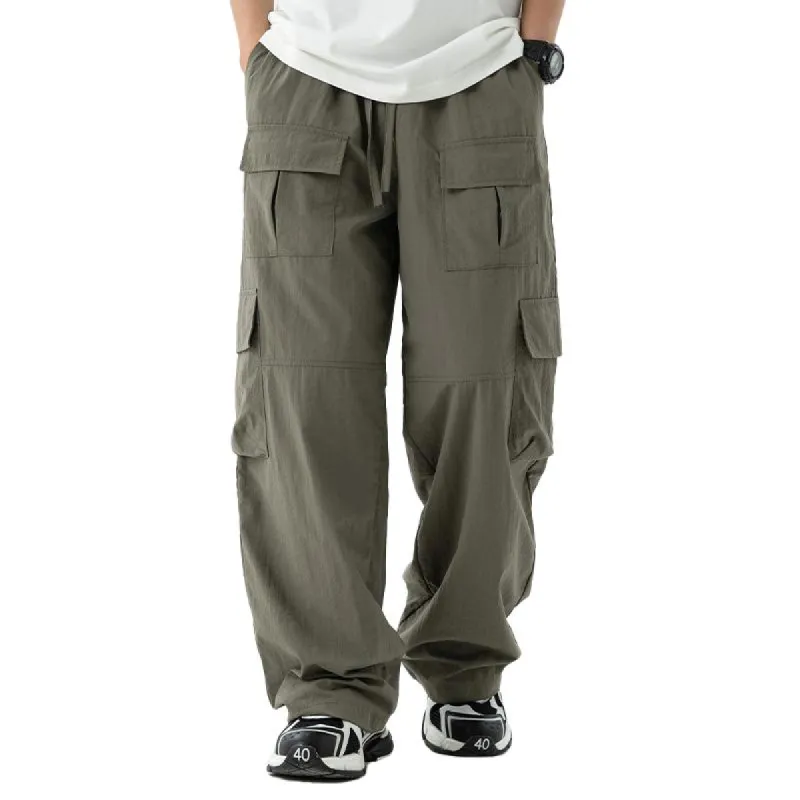 Men's Solid Loose Multi-pocket Elastic Waist Cargo Pants 73317666Z sold by Manly