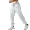 Men's Loose Elastic Solid Color Sports Pants 38835123X sold by Manly