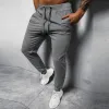 Men's Casual Solid Color Elastic Waist Loose Sports Pants 12510361M sold by Manly